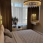 атмосфера, 11 этаж, в стиле капучино Апартаменти